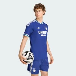 Koszulka wyjazdowa FC Copenhagen 26/27. Niebieskie t-shirty sportowe męskie Adidas, l, z dzianiny, bez ramiączek, do piłki nożnej, climacool (adidas). Za 439.00 zł.