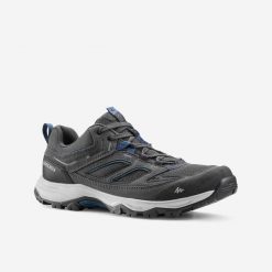 Buty turystyczne męskie Quechua MH100. Niebieskie buty trekkingowe męskie QUECHUA, na jesień, z kauczuku, bez zapięcia, outdoorowe. Za 169.99 zł.