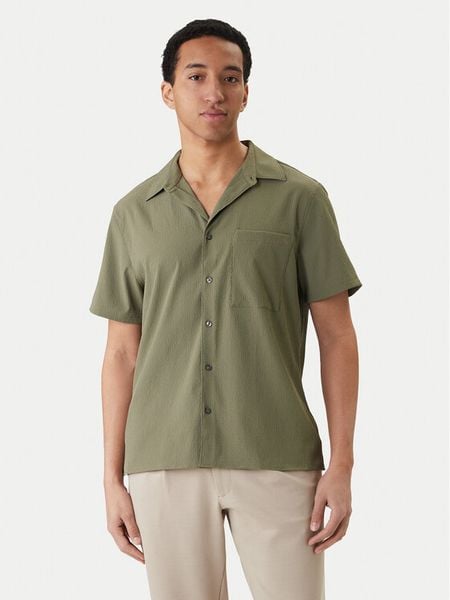 Calvin Klein Koszula LV04LF109G Zielony Classic Fit. Zielone koszule męskie CALVIN KLEIN, m, bez wzorów, z syntetyku, bez kołnierzyka, bez ramiączek. Za 409.99 zł.