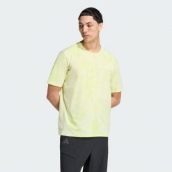 Koszulka Terrex Multi CLIMACOOL z nadrukiem. Żółte jeansy damskie Adidas, z standardowym stanem. Za 199.00 zł.