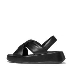 Sandały damskie FitFlop F-Mode Knot Soft-Leather Flatform B/Strap. Czarne sandały damskie Flip Flop, bez wzorów, z materiału, bez obcasa, na płaskiej podeszwie. Za 577.90 zł.