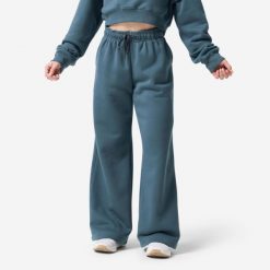 Spodnie dresowe damskie Domyos. Niebieskie spodnie sportowe damskie DOMYOS, l, z bawełny, na fitness i siłownię. Za 149.99 zł.
