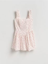 Wzorzysta sukienka mini - wielobarwny. Sukienki damskie Reserved, l, bez wzorów, z dzianiny, bez kołnierzyka, bez ramiączek, mini, rozkloszowane. Za 99.99 zł.