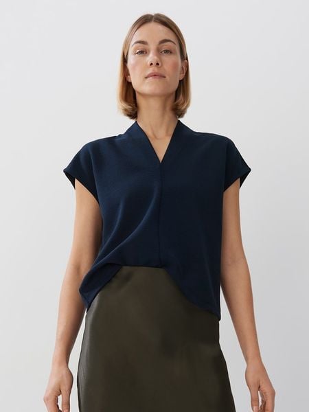 Someday Bluzka w kolorze granatowym rozmiar: 38. Niebieskie bluzki damskie Someday, bez wzorów, bez kołnierzyka, bez ramiączek. Za 154.95 zł.
