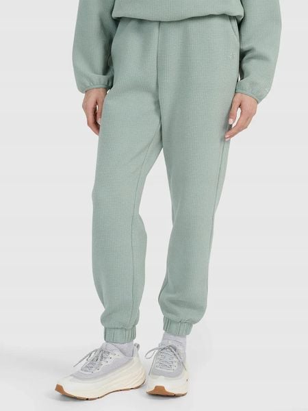 SPODNIE DAMSKIE DRESOWE 4F Z DZIANINY WAFLOWEJ TTROF1184 XL. Zielone spodnie sportowe damskie 4f, uniwersalny, z bawełny, na fitness i siłownię. Za 169.99 zł.