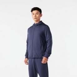 Bluza do biegania męska Kiprun Run 100 Warm ocieplana. Niebieskie bluzy bez kaptura męskie KIPRUN, m, z elastanu. Za 119.99 zł.