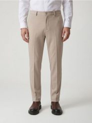 Spodnie chino slim fit - beżowy. Brązowe spodnie materiałowe męskie Reserved, bez wzorów, z dzianiny. Za 139.99 zł.