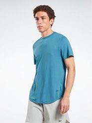Reebok T-Shirt ACTIVCHILL+DREAMBLEND T-Shirt HR6167 Niebieski Regular Fit. Niebieskie t-shirty męskie Reebok, l, bez wzorów, bez kołnierzyka. Za 109.99 zł.