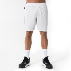 Spodenki do koszykówki unisex Short 100. Białe szorty damskie KIPSTA, bez wzorów, z materiału, sportowe. Za 29.99 zł.