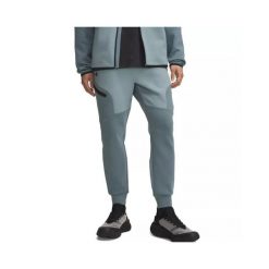 Spodnie dresowe Under Armour UNSTOPPABLE FLC JOGGER. Czarne spodnie sportowe męskie Under Armour, z bawełny. Za 443.15 zł.