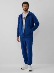 4F Spodnie dresowe joggery męskie - granatowe XL. Niebieskie spodnie dresowe męskie 4f, bez wzorów, z dresówki. Za 189.99 zł.