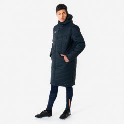 Długa parka do piłki nożnej. Czarne parki męskie KIPSTA, xl, bez wzorów. Za 349.99 zł.