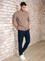 Spodnie chino slim - granatowy. Niebieskie spodnie materiałowe męskie Sinsay, bez wzorów. Za 49.99 zł.