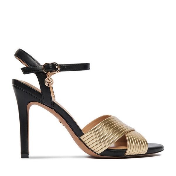 Sandały Nine West. Żółte sandały damskie Nine West, bez wzorów, bez obcasa, na szpilce. Za 229.99 zł.