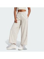 Adidas Spodnie dresowe Essentials 3-Stripes JC8168 Beżowy Loose Fit. Brązowe spodnie dresowe damskie Adidas, l, bez wzorów, z dresówki. Za 219.99 zł.