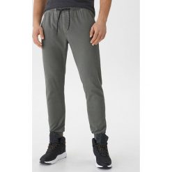 Spodnie typu jogger - Khaki. Brązowe spodnie materiałowe damskie House, bez wzorów. Za 79.99 zł.