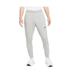 Spodnie sportowe męskie Nike Drifit Trapered. Szare spodnie sportowe męskie Nike, z dresówki. Za 368.00 zł.