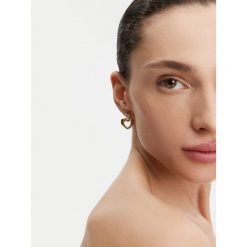 Kolczyki Guess. Żółte kolczyki damskie Guess, złote. Za 219.99 zł.