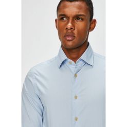 G-Star Raw - Koszula. Niebieskie koszule męskie G-Star Raw, m, bez wzorów, z bawełny, bez kołnierzyka, bez ramiączek. W wyprzedaży za 199.90 zł.