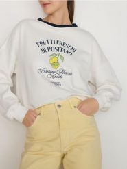 Bluza z nadrukiem - złamana biel. Bluzy bez kaptura damskie Reserved, l, z bawełny. W wyprzedaży za 99.99 zł.