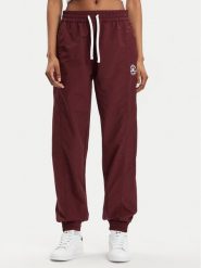 Converse Spodnie dresowe Star Printer 10026055-A02 Bordowy Tapered Fit. Czerwone spodnie dresowe damskie Converse, xl, bez wzorów, z dresówki. Za 239.99 zł.