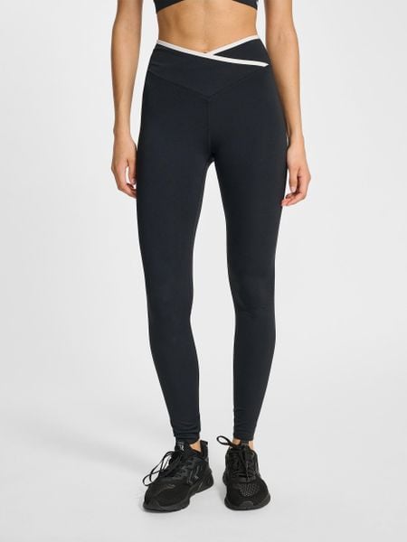 Damskie legginsy z wysokim stanem Hummel Wrap. Czarne legginsy damskie HUMMEL, l, bez wzorów, z materiału. Za 245.85 zł.