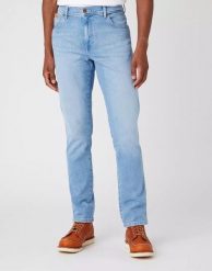 WRANGLER TEXAS SLIM MĘSKE SPODNIE JEANSOWE BLUE CHAMP W12SYI29K 112145802. Niebieskie spodnie materiałowe męskie Wrangler, bez wzorów, z jeansu. W wyprzedaży za 114.99 zł.