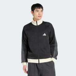 BLUZA DRESOWA Z PIKI O STANDARDOWYM KROJU STADIUM. Czarne bluzy bez kaptura męskie Adidas, uniwersalny, z bawełny. Za 349.00 zł.