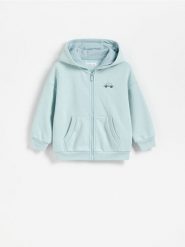 Bawełniana bluza oversize - jasnozielony. Zielone bluzy i bluzki niemowlęce Reserved, bez wzorów, z bawełny, bez ramiączek, bez kaptura. Za 49.99 zł.