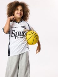 T-shirt San Antonio Spurs NBA - biały. Białe koszulki dziewczęce Reserved, bez wzorów, z dzianiny, bez ramiączek. Za 65.99 zł.