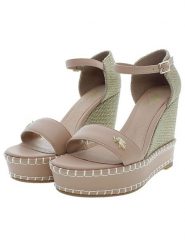 U.S. Polo Assn. Sandały w kolorze beżowym na koturnie rozmiar: 35. Brązowe sandały damskie U.S. Polo Assn., bez wzorów, bez obcasa, na koturnie. Za 223.99 zł.