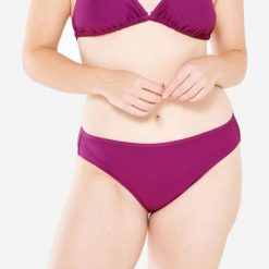 Dół kostiumu kąpielowego surfingowego damski Olaian Nina teksturowany. Fioletowe bikini damskie OLAIAN, bez wzorów. W wyprzedaży za 19.99 zł.