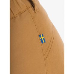 Spodnie outdoorowe damskie Fjallraven Stina Trousers. Brązowe spodnie dresowe damskie Fjällräven, na lato, l, bez wzorów. Za 682.95 zł.