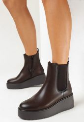 Ciemnobrązowe Botki na Koturnie i Platformie w Stylu Sztybletów Amolissa. Brązowe botki damskie Born2be, eleganckie, bez obcasa, na koturnie, bez zapięcia. Za 109.99 zł.