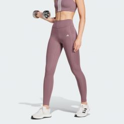 Legginsy Optime Full-Length. Fioletowe legginsy damskie Adidas, bez wzorów, z materiału. Za 279.00 zł.