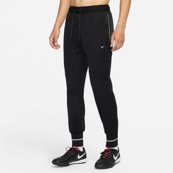 Spodnie sportowe męskie Nike Strike 22 Sock Cuff Pant. Białe spodnie sportowe męskie Nike, z bawełny. W wyprzedaży za 226.30 zł.