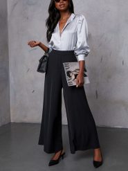 LA Angels Spodnie w kolorze czarnym rozmiar: S. Czarne spodnie materiałowe damskie LA Angels, bez wzorów, z materiału, z podwyższonym stanem. Za 200.13 zł.