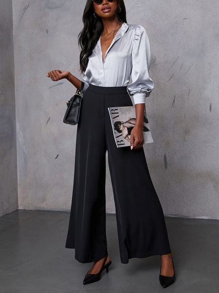 LA Angels Spodnie w kolorze czarnym rozmiar: S. Czarne spodnie materiałowe damskie LA Angels, bez wzorów, z materiału, z podwyższonym stanem. Za 243.64 zł.