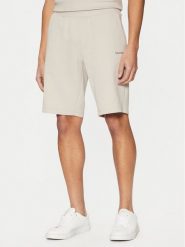 Calvin Klein Szorty sportowe Micro Logo K10K111208 Beżowy Regular Fit. Brązowe szorty męskie CALVIN KLEIN, m, z bawełny. Za 209.99 zł.