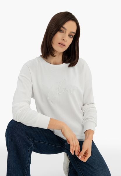 Bluza z napisem B-GLOW. Białe bluzy bez kaptura damskie Volcano, s, z bawełny. Za 139.99 zł.