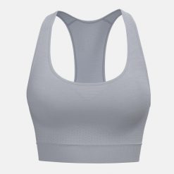 FLEX SEAMLESS damski biustonosz sportowy. Białe biustonosze sportowe damskie HEAD, bez wzorów. Za 260.00 zł.