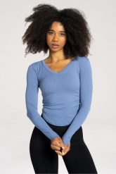 Koszulka fitness damska Gym Glamour wycięta z długimi rękawami. Białe bluzki sportowe damskie GYM GLAMOUR, l, z materiału, bez kołnierzyka, bez ramiączek. Za 149.99 zł.