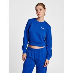 Damska krótka bluza Hummel LGC Shai. Niebieskie bluzy sportowe damskie HUMMEL, s, bez wzorów, z bawełny, bez ramiączek, krótkie, bez kaptura. Za 236.50 zł.