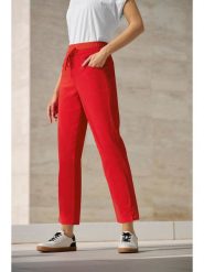 Heine Spodnie dresowe w kolorze czerwonym rozmiar: 34. Czerwone spodnie dresowe damskie Heine, bez wzorów, z dresówki. Za 65.38 zł.