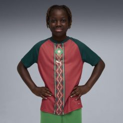 Młodzieżowa koszulka na rozgrzewkę Maroka PUMA. Czerwona bluzki damskie Puma, m, bez wzorów, młodzieżowe, bez kołnierzyka, bez ramiączek. Za 323.50 zł.