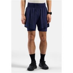 Spodenki męskie Odlo X-ALP TRAIL 6 INCH 2-in-1 short. Niebieskie szorty męskie Odlo, bez wzorów, sportowe. W wyprzedaży za 359.99 zł.