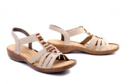 RIEKER 60851-62 beige, sandały damskie. Brązowe sandały damskie Rieker, bez wzorów, bez obcasa. Za 299.90 zł.