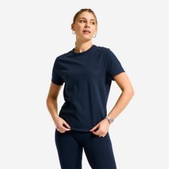 Koszulka fitness damska Domyos. Niebieskie topy sportowe damskie DOMYOS, l, bez wzorów, z bawełny, bez ramiączek. Za 12.49 zł.