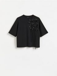 T-shirt z bawełną - czarny. Czarne t-shirty damskie Reserved, l, bez wzorów, z bawełny, bez kołnierzyka. Za 89.99 zł.