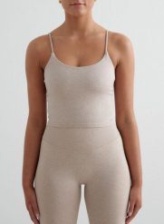 Damski top treningowy bezszwowy, modelujący, cienkie ramiączka Shape beż melanż. Brązowe topy sportowe damskie Aim'n, l, bez wzorów, z dzianiny, bez ramiączek. Za 158.25 zł.
